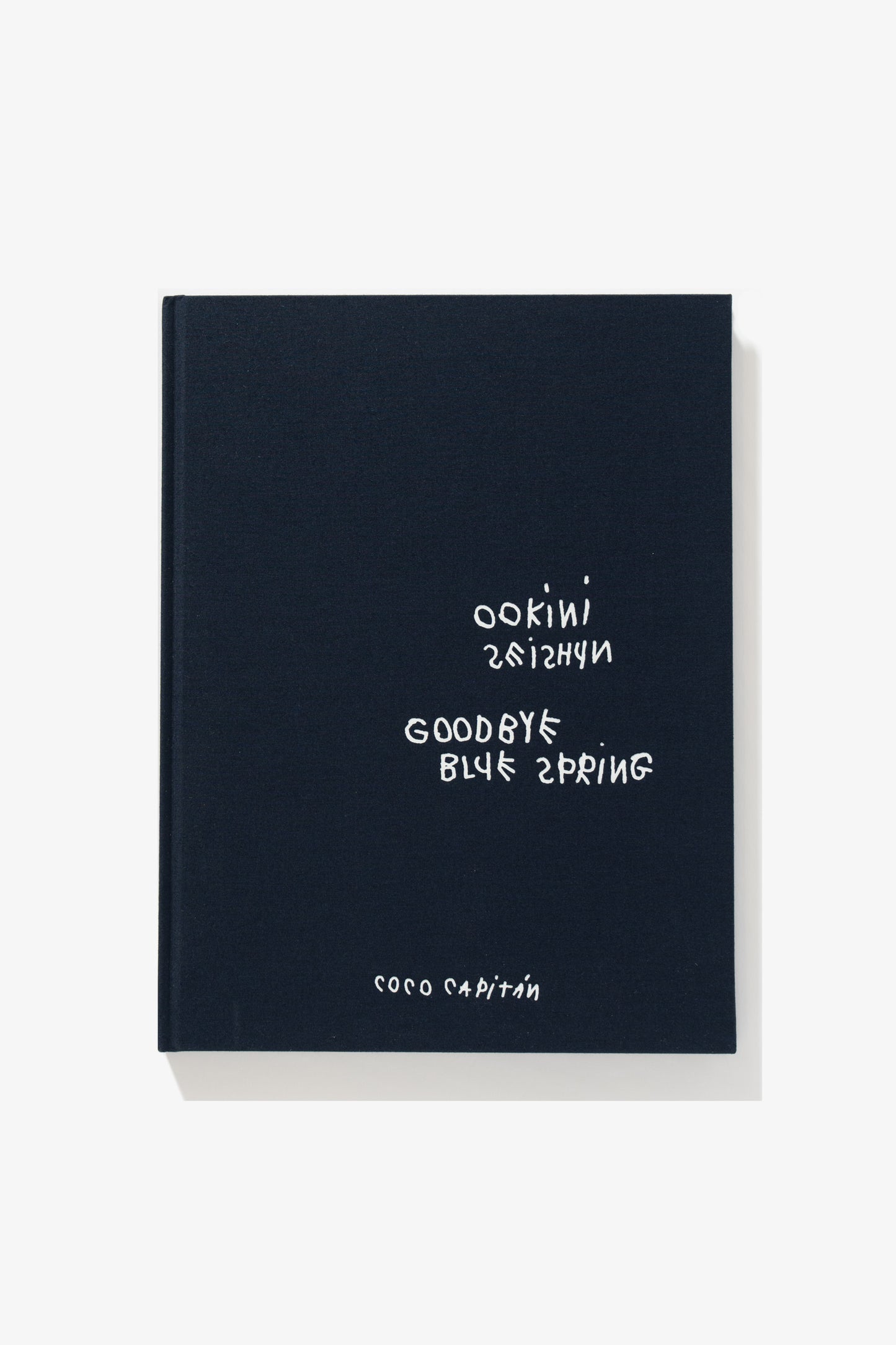 Full-length image of the cover of Coco Capitan’s photography book, Goodbye Blue Spring. 