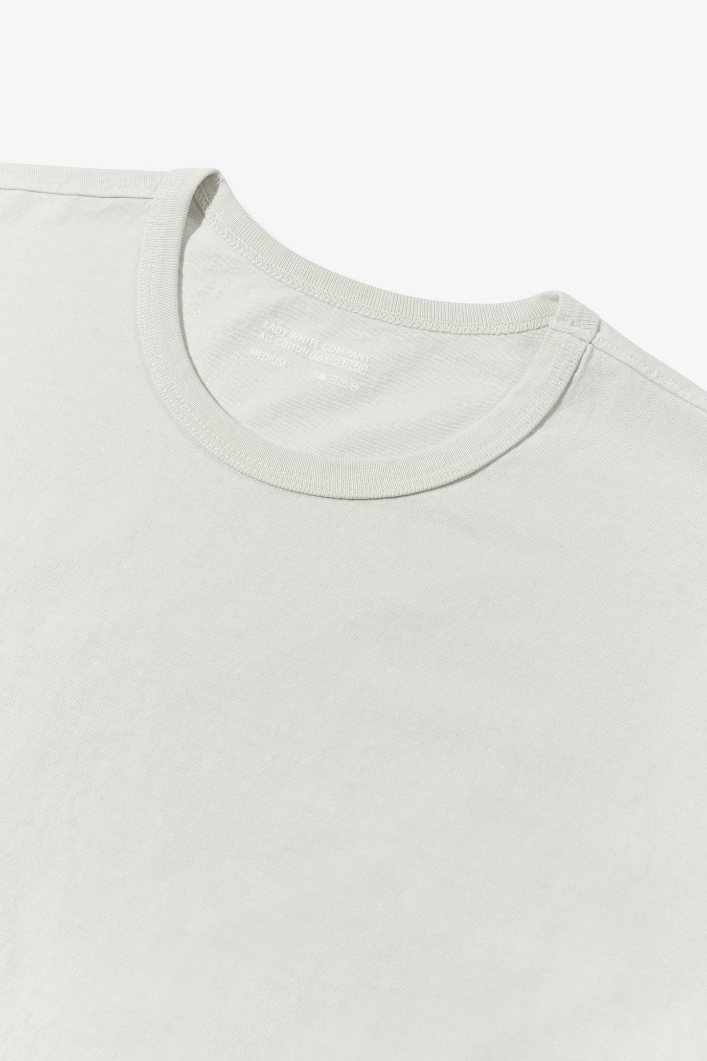 Close-up of collar of LW101 Our T-shirt in off white