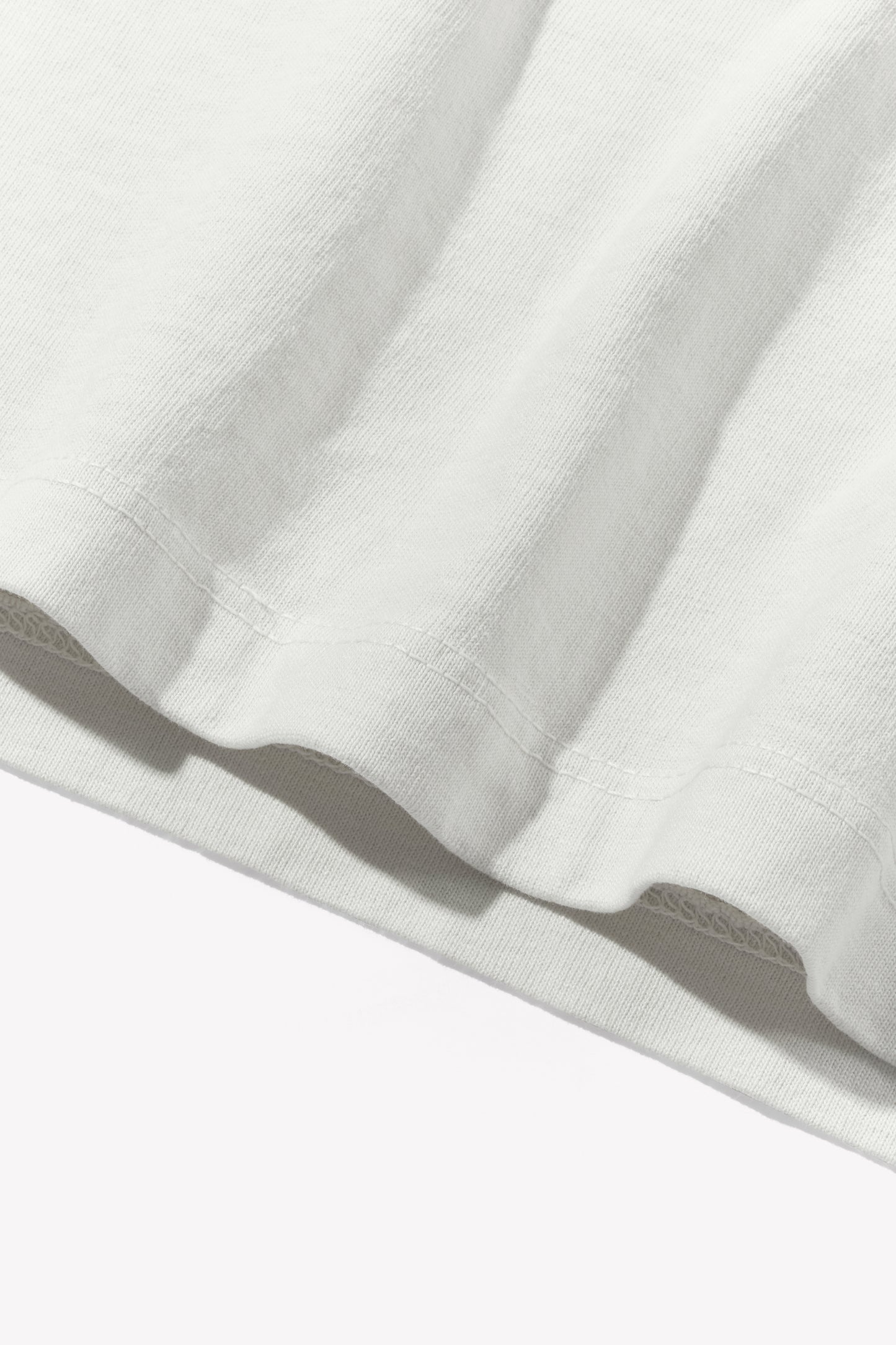 Close-up of fabric ripple of LW101 Our T-shirt in off white