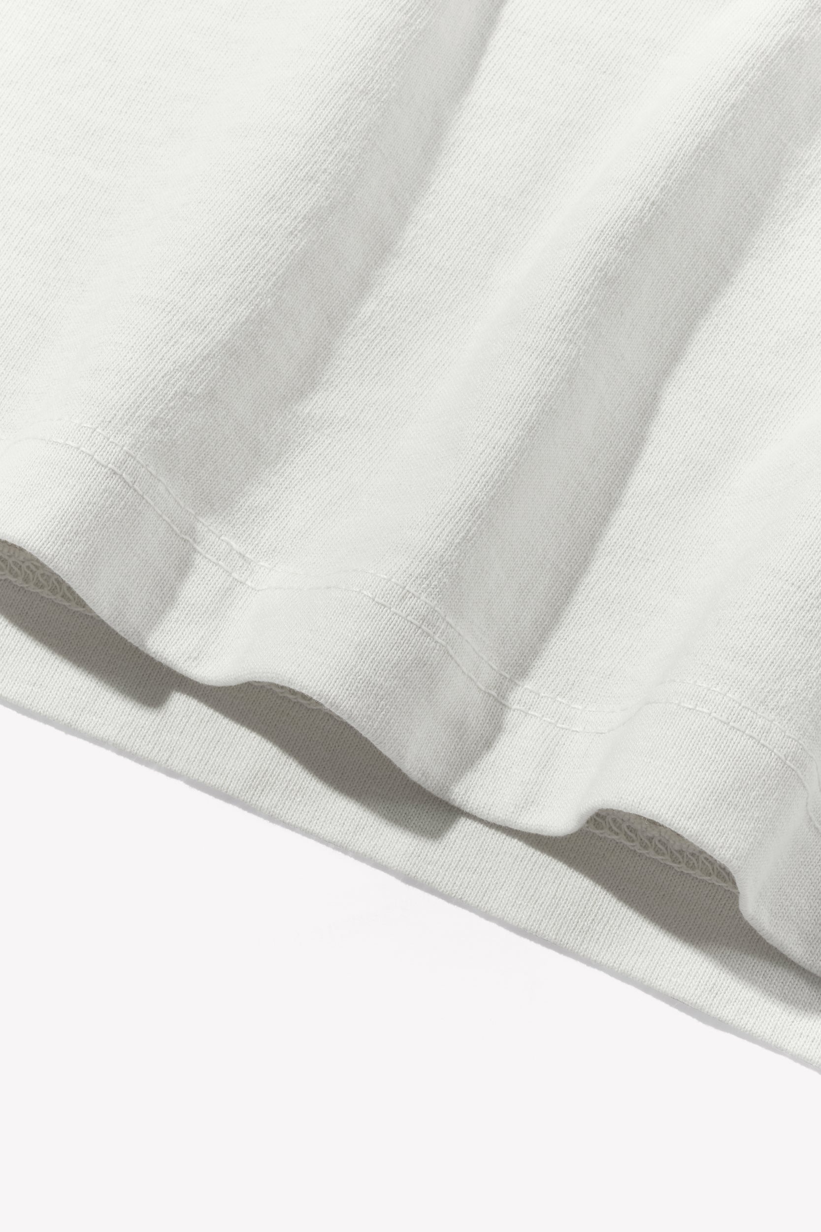 Close-up of fabric ripple of LW101 Our T-shirt in off white